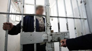 Mbarek Hyani, one of the 111 death row prisoners held at the central prison of Kenitra in Morocco, poses 01 February 2007. Moroccan prisons are holding a total of 131 death row prisoners, five of whom are women. Morocco is to participate in the third World Congress Against the Death Penalty opening today in Paris. Amnesty International said at least 1,770 people were known to have been executed and 3,900 people sentenced to death during 2005, based on public reports. However human rights groups believe the real number of people executed annually could be as high as 10,000 to 20,000. PHOTO/AFP/ABDELHAK SENNA