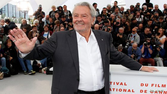 FILE PHOTO: 72nd Cannes Film Festival - Honorary Palme d’Or Award - Photocall - Cannes, France, May 19, 2019. Alain Delon gestures. REUTERS/Jean-Paul Pelissier/File Photo