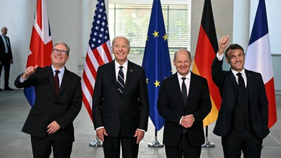 (L-R) British Prime Minister Keir Starmer, US President Joe Biden, German Chancellor Olaf Scholz and French President Emmanuel Macron pose for a photo as they arrive for their Quad meeting at the Chancellery in Berlin, on October 18, 2024. (Photo by Tobias SCHWARZ / AFP)