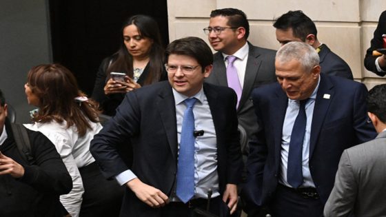 Senator Miguel Uribe Turbay (C) looks on after the Senate voted against the government labor reform referendum promoted by Colombia's President Gustavo Petro in Bogota on May 14, 2025. A Colombian right-wing opposition senator and candidate for next year's presidential election, Miguel Uribe Turbay, 39, was shot and wounded in Bogota on June 7, 2025, various media reported, while the government denounced an "attack." (Photo by Raul ARBOLEDA / AFP) (Photo by RAUL ARBOLEDA/AFP via Getty Images)