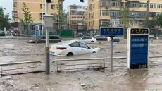 أمطار غزيرة تجتاح العاصمة الصينية وإجلاء الآلاف