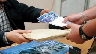 ضبط قائد وعون سلطة بمراكش متلبسين بتلقي رشوة داخل مقهى