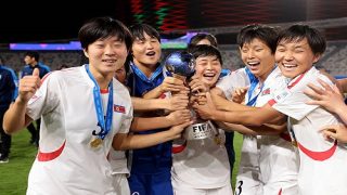 RABAT, MOROCCO - NOVEMBER 08: Players of Korea DPR pose for a photo with the FIFA U-17 Women's World Cup Morocco 2025 Trophy following the FIFA U-17 Women's World Cup Morocco 2025 Final match between Korea DPR and Netherlands on November 08, 2025 in Rabat, Morocco. (Photo by Jonathan Moscrop - FIFA/FIFA via Getty Images)