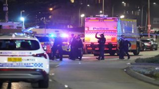 Police cordon off an area at Bondi Beach after a reported shooting in Sydney, Sunday, Dec. 14, 2025. (AP Photo/Mark Baker)